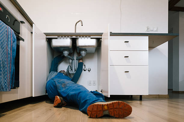 Professional Emergency Plumber technician working in Hillsboro, AL